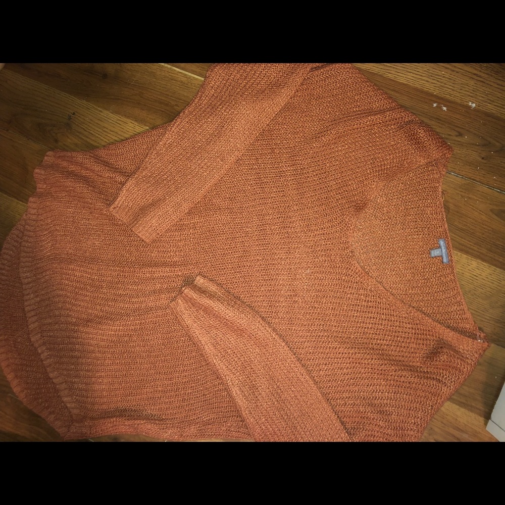 salmon colored sweater